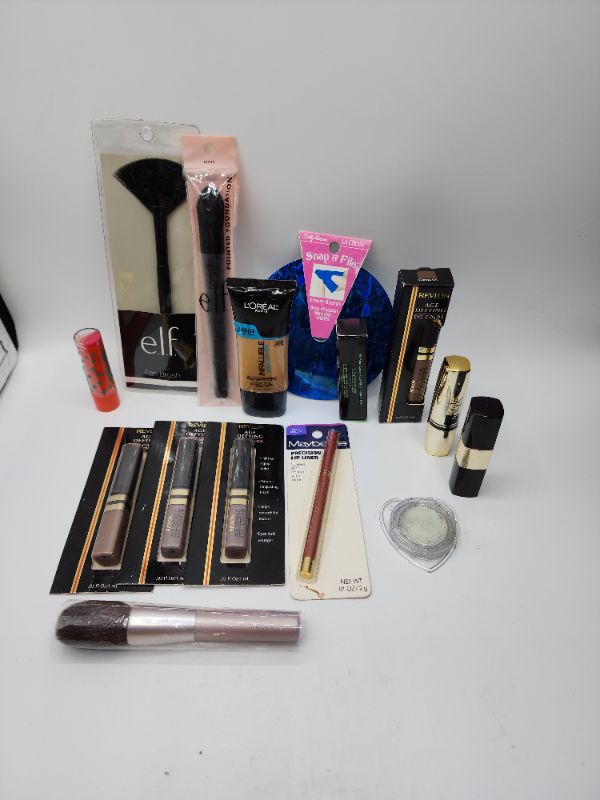 Photo 1 of Miscellaneous Variety Brand Name Cosmetics Including (( Revlon, Elf, Blossom, Sally Hansen, Loreal, Itstyle, Vincent Longo, Mally, Maybelline)) Including Discontinued Makeup Products 