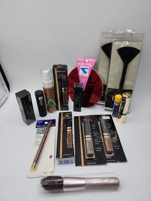 Photo 1 of Miscellaneous Variety Brand Name Cosmetics Including (( Revlon, Elf, Vincent Longo, Sally Hansen, Loreal, Itstyle, Almay)) Including Discontinued Makeup Products 