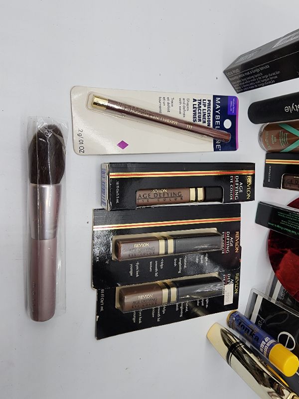 Photo 1 of Miscellaneous Variety Brand Name Cosmetics Including (( Revlon, Elf, Vincent Longo, Sally Hansen, Loreal, Itstyle, Almay)) Including Discontinued Makeup Products 