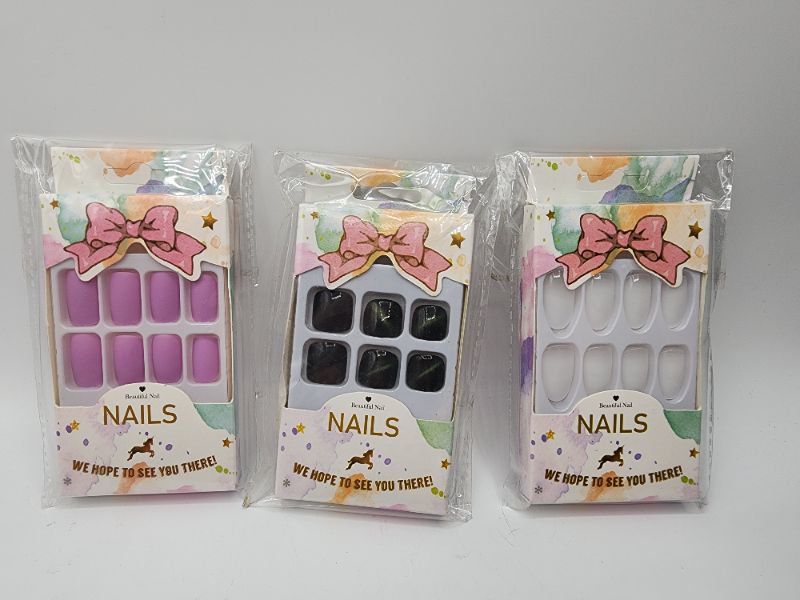Photo 1 of 3 Pack Press on Nils 