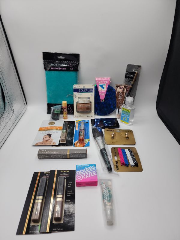 Photo 1 of Miscellaneous Variety Brand Name Cosmetics Including (( Vincent Longo, Cover Girl, Revlon, Blossom, Models Own, Miss Spa, Lip Smackers, Loreal, Naturistic,Karina, Sally Hansen))  Including Discontinued Makeup Products