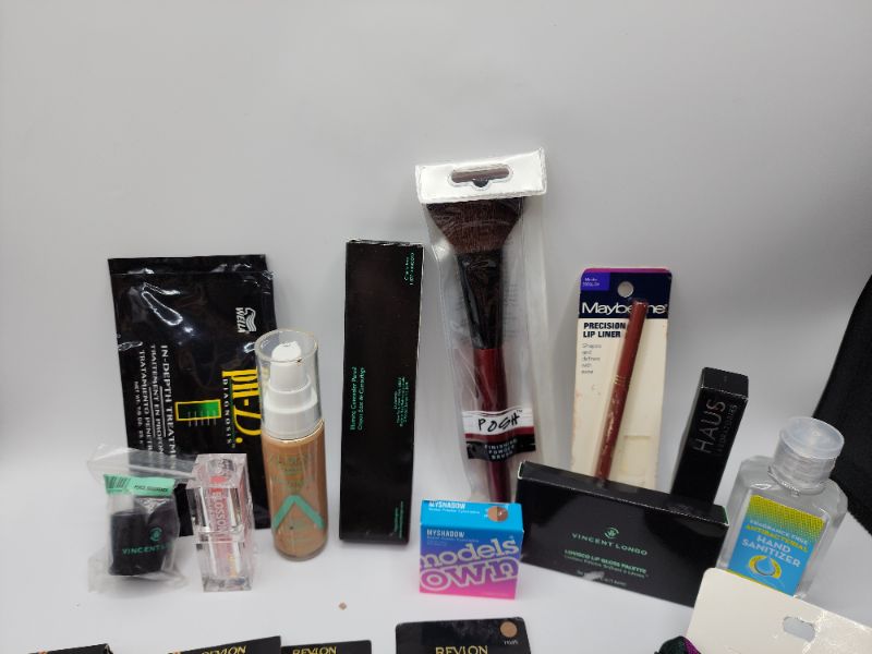 Photo 3 of Miscellaneous Variety Brand Name Cosmetics Including (( Models Own, Revlon, Vincent Longo, Maybelline, Blossom,Wella, Haus,Posh)  Including Discontinued Makeup Products