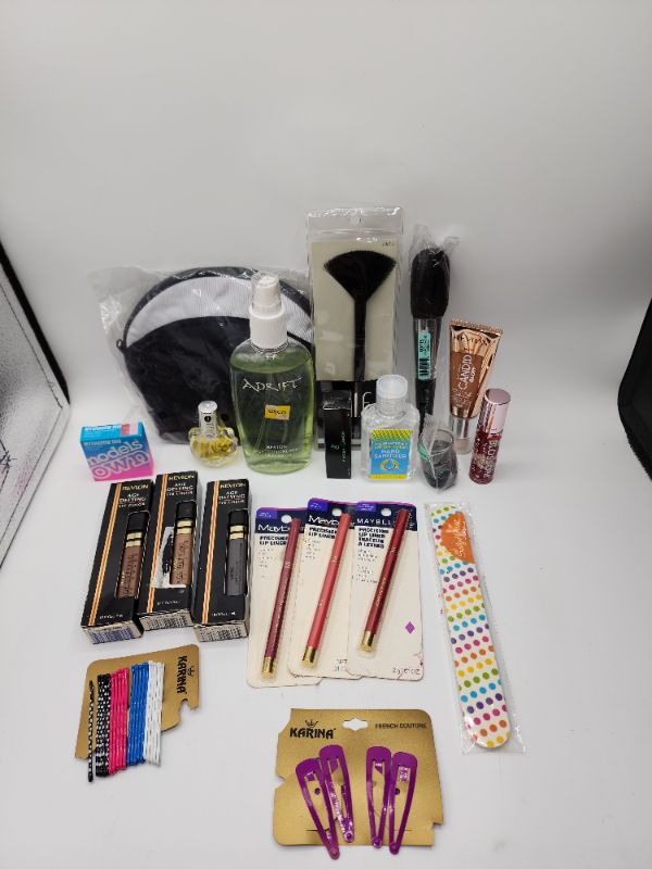 Photo 1 of Miscellaneous Variety Brand Name Cosmetics Including (( Adrift, Elf, Revlon, Models Own, Hello Kitty, Sally Hansen, Maybelline, Blossom, Vincent Longo))  Including Discontinued Makeup Products