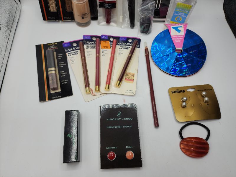 Photo 2 of Miscellaneous Variety Brand Name Cosmetics Including (( ItStyle, Elf, Revlon, Sally Hansen, Maybelline, Jordana, Vincent Longo))  Including Discontinued Makeup Products