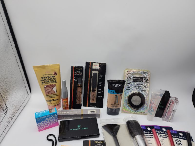 Photo 3 of Miscellaneous Variety Brand Name Cosmetics Including (( Loreal, Elf, Revlon, Naturistics, Vincent Longo, Fetish))  Including Discontinued Makeup Products