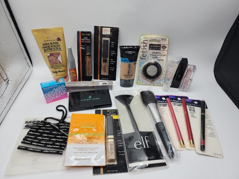 Photo 1 of Miscellaneous Variety Brand Name Cosmetics Including (( Loreal, Elf, Revlon, Naturistics, Vincent Longo, Fetish))  Including Discontinued Makeup Products