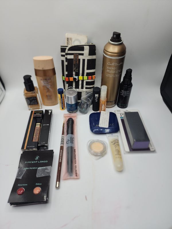 Photo 1 of Miscellaneous Variety Brand Name Cosmetics Including (( Revlon, Wella, Vincent Longo, ItStyle, Maybelline, Elf, Fruity Jelly, Pro, Natureistic, Almay, BurtsBees)) Including Discontinued Makeup Products