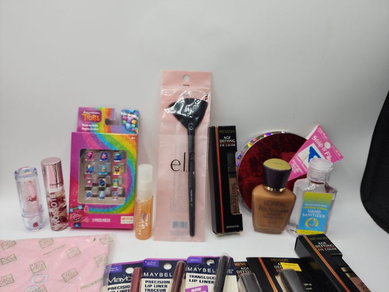 Photo 3 of Miscellaneous Variety Brand Name Cosmetics Including (( Elf, Trolls, Maybelline, Revlon, Blossom, Sally Hansen, Vincent Longo)) Including Discontinued Makeup Products
