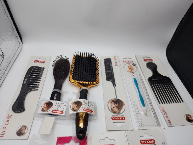 Photo 2 of Titania Hair and Nail Products 2 Brushes, 1 Regular Comb, 1 Rat Tail Comb, 1 Pick, 1 Hair Brush Cleaner, 1 Nail Clipper, and 1 Nail Cuticle Scissors 