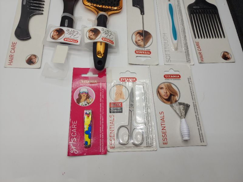 Photo 3 of Titania Hair and Nail Products 2 Brushes, 1 Regular Comb, 1 Rat Tail Comb, 1 Pick, 1 Hair Brush Cleaner, 1 Nail Clipper, and 1 Nail Cuticle Scissors 