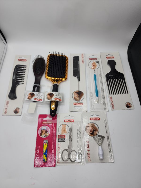 Photo 1 of Titania Hair and Nail Products 2 Brushes, 1 Regular Comb, 1 Rat Tail Comb, 1 Pick, 1 Hair Brush Cleaner, 1 Nail Clipper, and 1 Nail Cuticle Scissors 