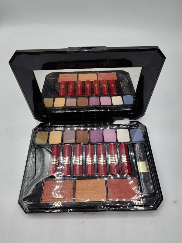 Photo 1 of Revlon Makeup Pallett, 8 Eyeshadows, 7 Lip Sticks, 3 Blush/Contour, 2 Brushes New 
