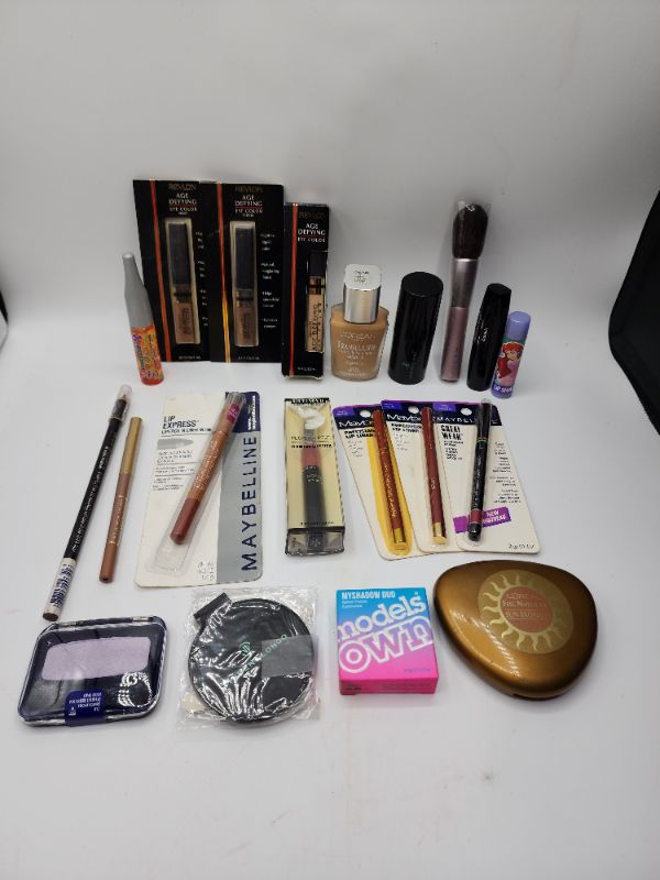 Photo 1 of Miscellaneous Variety Brand Name Cosmetics Including (( Revlon, Maybelline, Naturistic, Loreal, Lip Smackers, ItStyler, Mally, Vincent Longo, Models Own, Cover Girl, Loreal, Ultima II,
  Including Discontinued Makeup Products