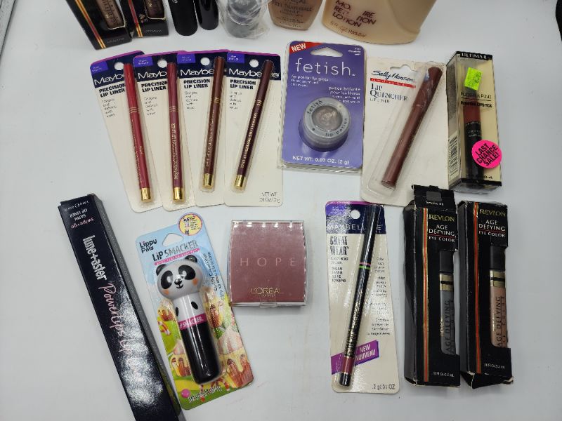 Photo 3 of Miscellaneous Variety Brand Name Cosmetics Including (( Maybelline, Revlon, Lip Smackers, Loreal, ItStyle, Ultima II, Vincent Longo Sally Hansen )) Including Discontinued Makeup Products