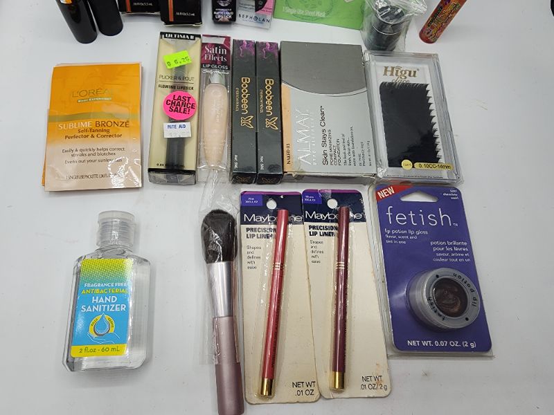 Photo 3 of Miscellaneous Variety Brand Name Cosmetics Including (( Maybelline, Revlon, Amber Dazzzle, Almay, ItStyle, Burts Bees, Vincent Longo, Boobeen, Higu, Mally, Fetish, Loreal)) Including Discontinued Makeup Products