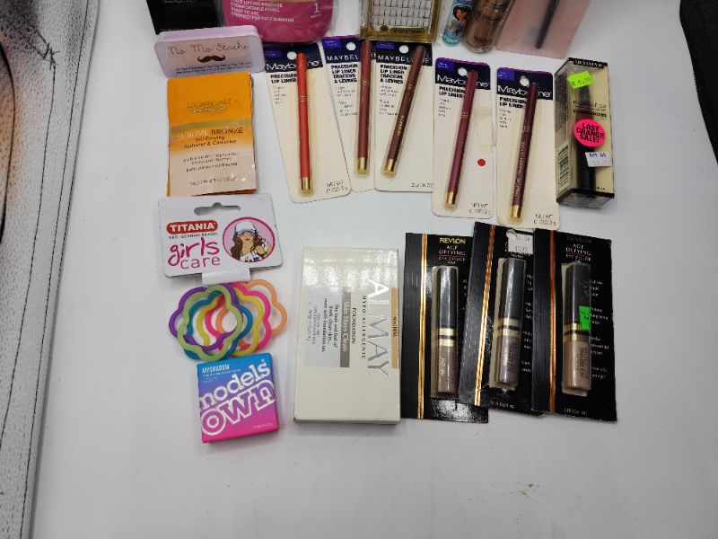 Photo 3 of Miscellaneous Variety Brand Name Cosmetics Including (( Elf, Maybelline, Revlon, Loreal, Models Own, Ultima II, Vincent Longo, Lip Smackers, Almay, Titania)) Including Discontinued Makeup Products