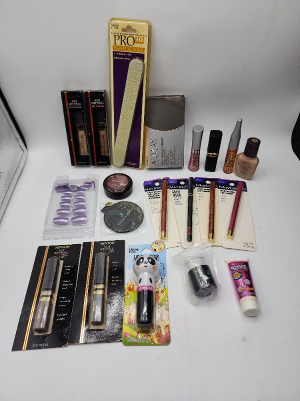 Photo 1 of Miscellaneous Variety Brand Name Cosmetics Including (( Maybelline, Revlon, Pro 10, Loreal, Almay, Vincent Longo, Bubble Yum, Lip Smackers)) Including Discontinued Makeup Products