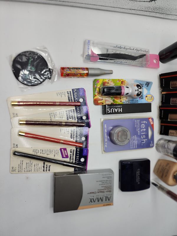 Photo 2 of Miscellaneous Variety Brand Name Cosmetics Including (( Maybelline, Revlon, It Girl, Loreal, ItStyle, Haus, Vincent Longo, Natueristic, Lip Smackers)) Including Discontinued Makeup Products