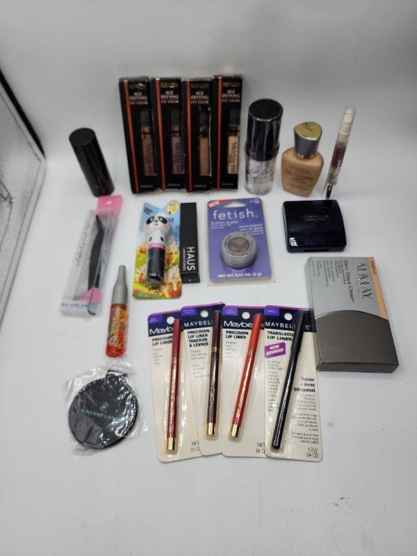 Photo 1 of Miscellaneous Variety Brand Name Cosmetics Including (( Maybelline, Revlon, It Girl, Loreal, ItStyle, Haus, Vincent Longo, Natueristic, Lip Smackers)) Including Discontinued Makeup Products