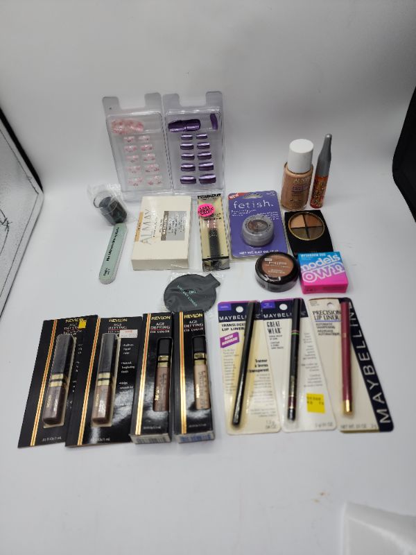 Photo 1 of Miscellaneous Variety Brand Name Cosmetics Including (( Maybelline, Revlon, Almay, Loreal, Fetish, Ultima II, Vincent Longo, Models Own, Lip Smackers)) Including Discontinued Makeup Products