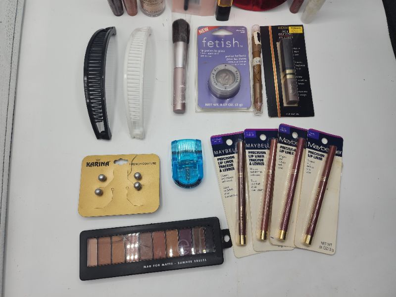 Photo 3 of Miscellaneous Variety Brand Name Cosmetics Including ((Elf, Sally Hansen, Blossom, Maybelline, Trim, LA Color))  Including Discontinued Makeup Products