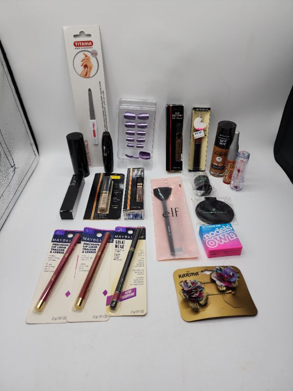 Photo 1 of Miscellaneous Variety Brand Name Cosmetics Including (( Elf, Maybelline, Revlon, Models Own, Vincent Longo, Ultima II, Natueristics, Blossom, Haus, Titania))  Including Discontinued Makeup Products