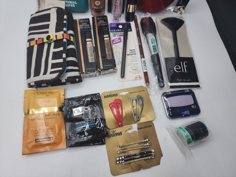 Photo 3 of Miscellaneous Variety Brand Name Cosmetics Including (( Elf, Maybelline, CoverGirl, Vincent Longo, Loreal, Nubi, Revlon, Sally Hansen, Blossom))  Including Discontinued Makeup Products