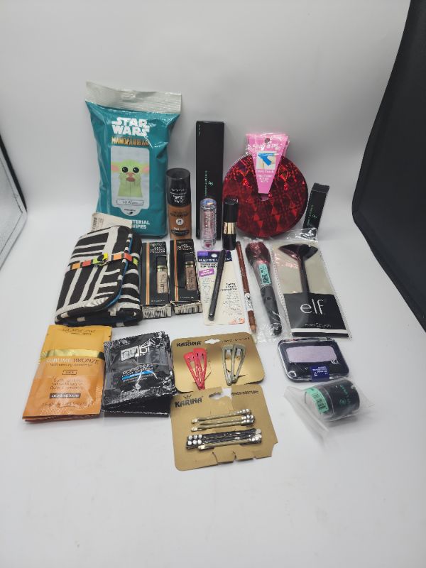 Photo 1 of Miscellaneous Variety Brand Name Cosmetics Including (( Elf, Maybelline, CoverGirl, Vincent Longo, Loreal, Nubi, Revlon, Sally Hansen, Blossom))  Including Discontinued Makeup Products