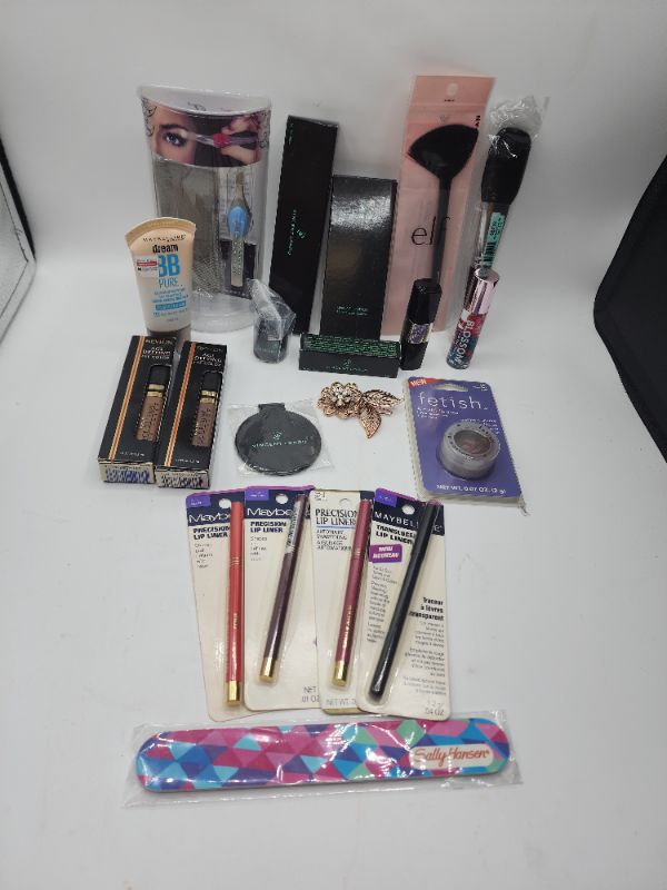 Photo 1 of Miscellaneous Variety Brand Name Cosmetics Including (( Elf, Maybelline, Fetish, Vincent Longo, Revlon, Blossom))  Including Discontinued Makeup Products