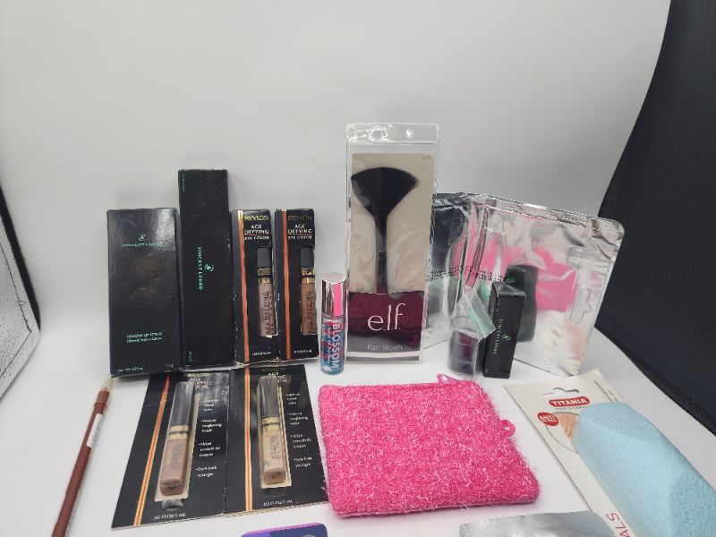 Photo 2 of Miscellaneous Variety Brand Name Cosmetics Including (( Elf, Maybelline, Titania, Lonris  Vincent Longo, Revlon, Sally Hansen, Blossom))  Including Discontinued Makeup Products