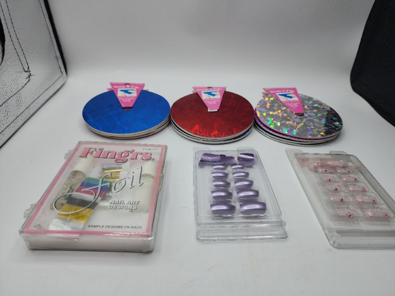 Photo 2 of Nail Kit With Press On Nails, Nail Foil, & Files 