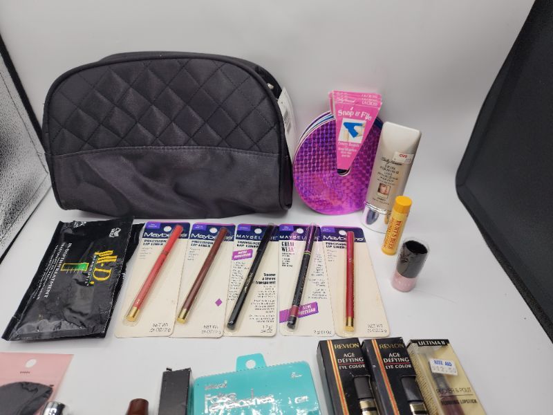 Photo 1 of Miscellaneous Variety Brand Name Cosmetics Including (( Sally Hansen, Maybelline, Wella, Revlon, Elf, UltimaII , Blossom, Bees)) Including Discontinued Makeup Products