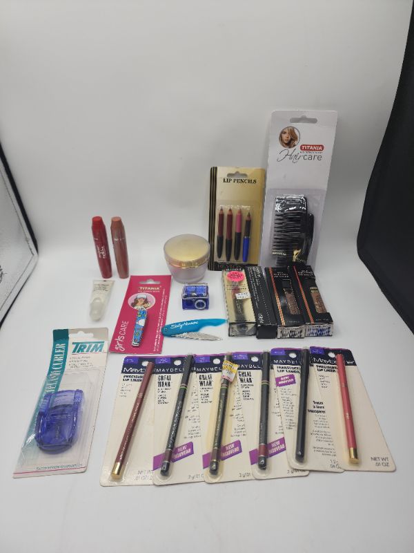 Photo 1 of Miscellaneous Variety Brand Name Cosmetics Including (( Sally Hansen, Ulltima II, Maybelline, Titania, Revlon, Fetish, Elf, Trim , Blossom)) Including Discontinued Makeup Products