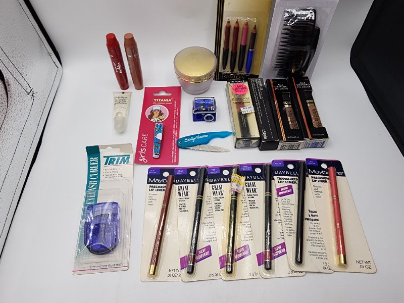 Photo 3 of Miscellaneous Variety Brand Name Cosmetics Including (( Sally Hansen, Ulltima II, Maybelline, Titania, Revlon, Fetish, Elf, Trim , Blossom)) Including Discontinued Makeup Products