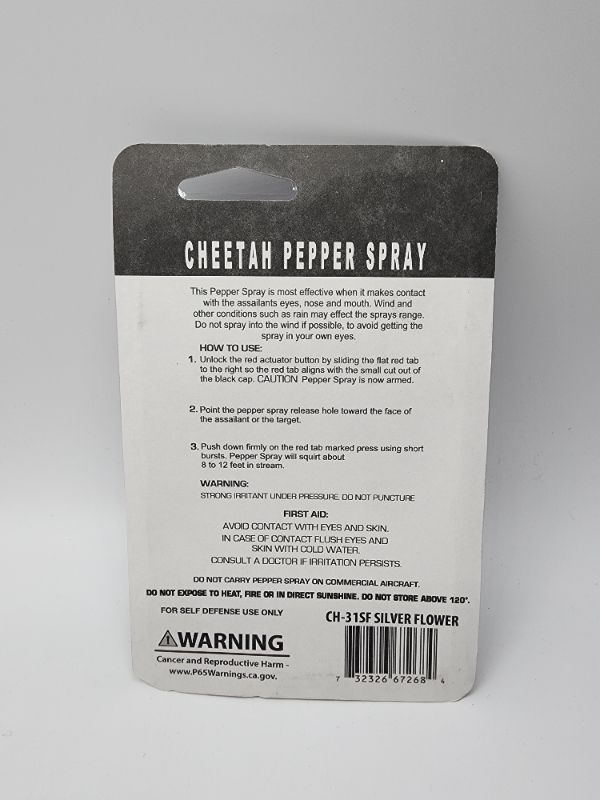 Photo 2 of 2 sparkly Silver Pack Cheetah Brand Pepper Spray with Carry Case