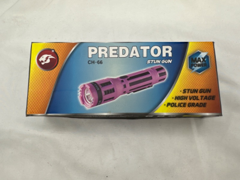 Photo 2 of Rubberized Grip Dual Flashlight Stun Gun New