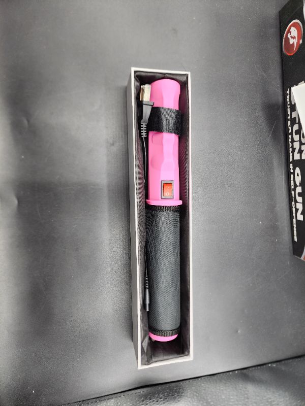 Photo 2 of Stun Gun Flash Light 10 Million Volts Rechargable Pink