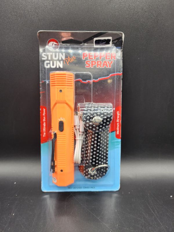 Photo 1 of Orange Volta Flash Light Stun Gun  & Pepper Spray COMBO Blister Pack
