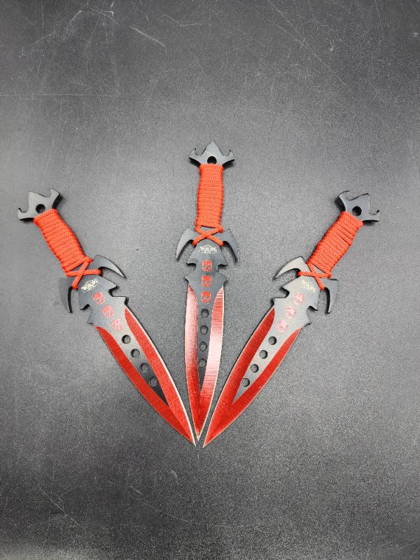 Photo 2 of Red Throwing Knives 