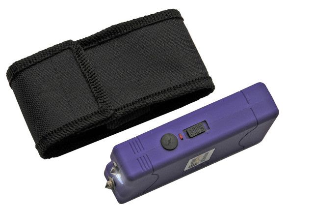 Photo 1 of Kwik Force 18,000,000 Ultra Spark Purple Stun Gun with Built in Charger Stun Gun