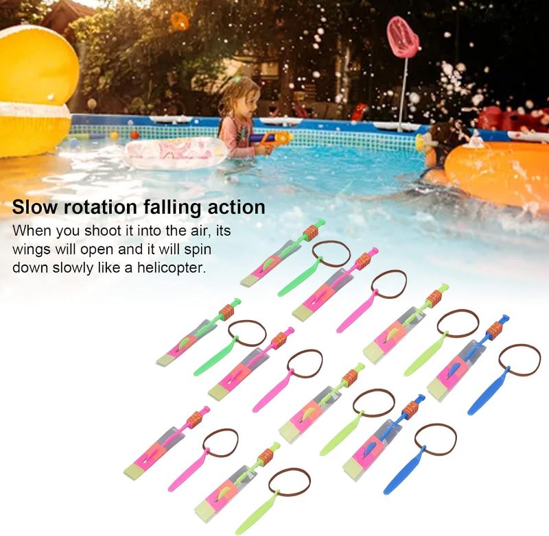 Photo 4 of KIDSTOYS- 100 PCS Cool LED Light Up Helicopters (Multicolored) Dragonfly Slingshot Style Flying Toy Arrow Launch Flies up to 100 Feet.
