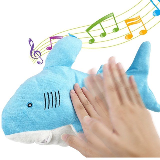 Photo 2 of Hesroicy Electric Plush Shark Toy USB Charging Simulated Singing Speaking Cute Shark Plushie Companion Soothe Toy Children Electric Swinging Shark Stuffed Animal Doll Birthday Gift

