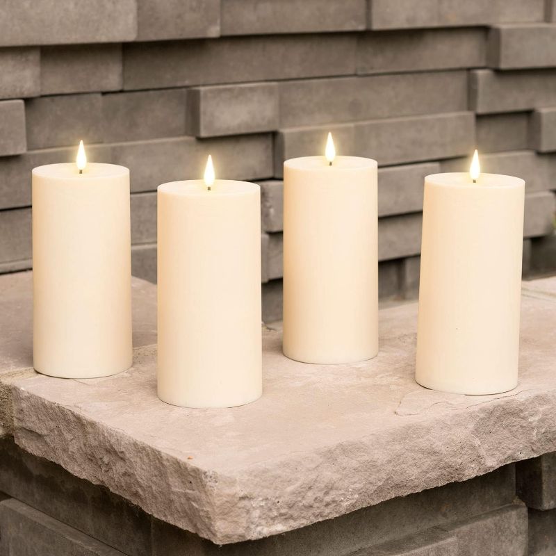 Photo 1 of LampLust Outdoor Ivory Flameless Candles with Timer Waterproof - 4 Pack, 3x6 LED Pillar Set, Patio Decor, Battery Operated, Realistic Flickering Light, Remote & Timer Included
