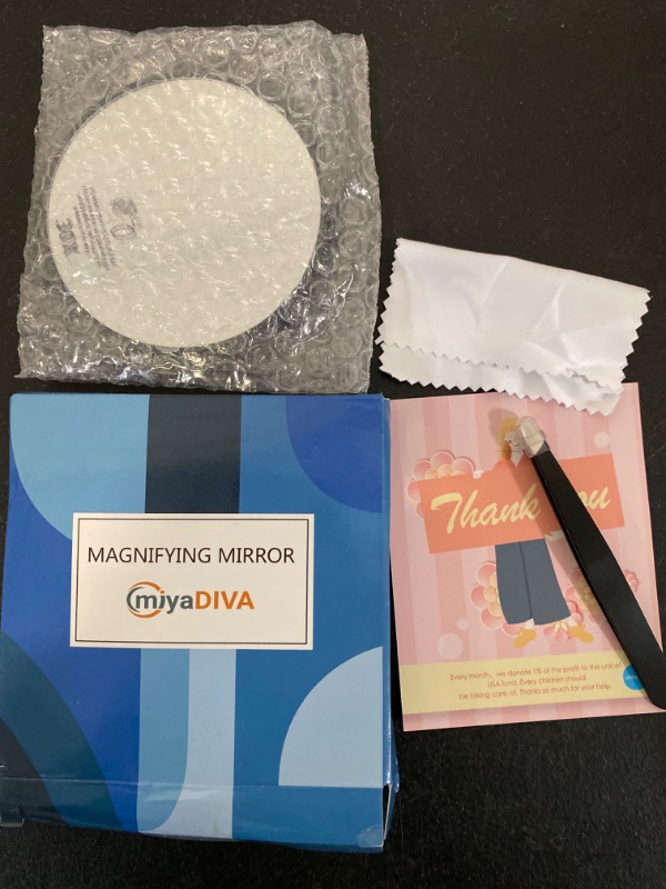 Photo 2 of MIYADIVA 30X Magnifying Mirror, Small Magnifying Mirror with Tweezers, As a Travel Mganifying Mirror, Compact Mirror Set for Plucking Eyebrows 3.5 Inches
