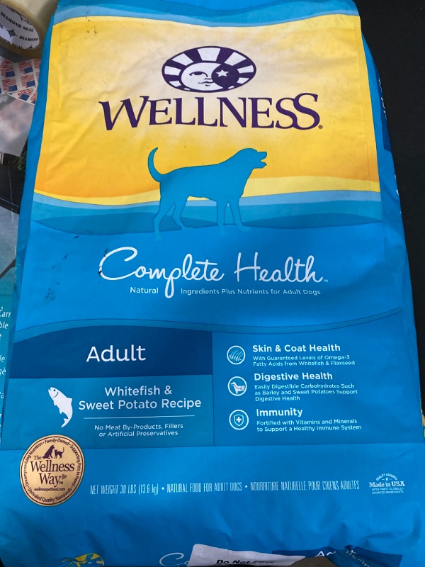 Photo 2 of Wellness Complete Health Dry Dog Food with Grains, Made in USA with Real Meat & Natural Ingredients, All Breeds, Adult Dogs (Whitefish, 30-lb) – With Nutrients for Immune, Skin, & Coat Support
