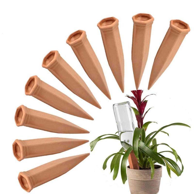 Photo 1 of FAMILy Plant Watering Stakes 10Pcs Automatic Plant Waterers for Vacations Plant Watering Devices Terracotta Self Waterinq Spikes for Wine Bottles Great for Indoor & Outdoor Plants
