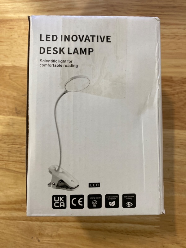 Photo 2 of SALUOKE Desk Lamp Reading Light: Clip-on Desk Lamp Eye Caring 20 LEDs Light Rechargeable Book Light with 3 Level Brightness 3 Color Modes and Touch Control, Reading Light for Home & Office
