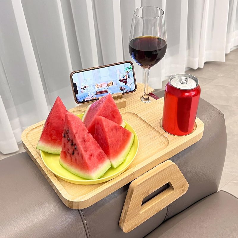 Photo 1 of BATTEO Sofa Arm Tray with Rotatable Phone Holder, Bamboo Couch Slip and Armrest Tray, Folding Couch Arm Table, Sofa Table, Side Table and TV Tray with Wine Glass Cup for Eating and Drinks, 9"x13" (Black)
