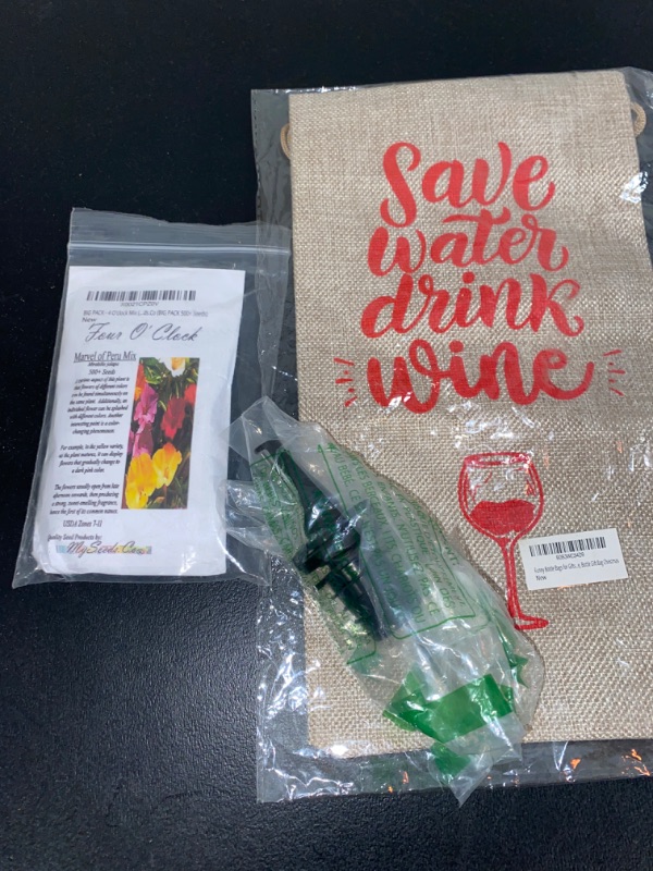 Photo 2 of International Metal Pourer , WINE BAG AND FLOWER SEEDS..