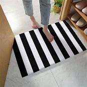 Photo 1 of Black and White Striped Bath Mat